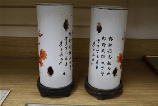 A pair of early 20th century Chinese lion-dog porcelain hat stands total height including stands 31.5cm